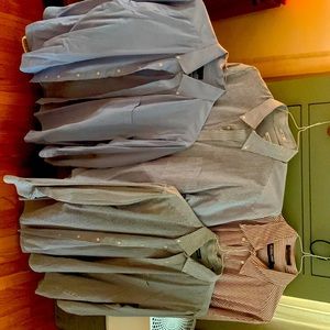 4  shirts. Blue stripe x 2. (Different shades) Dark red stripe x1. Solid Blue x1